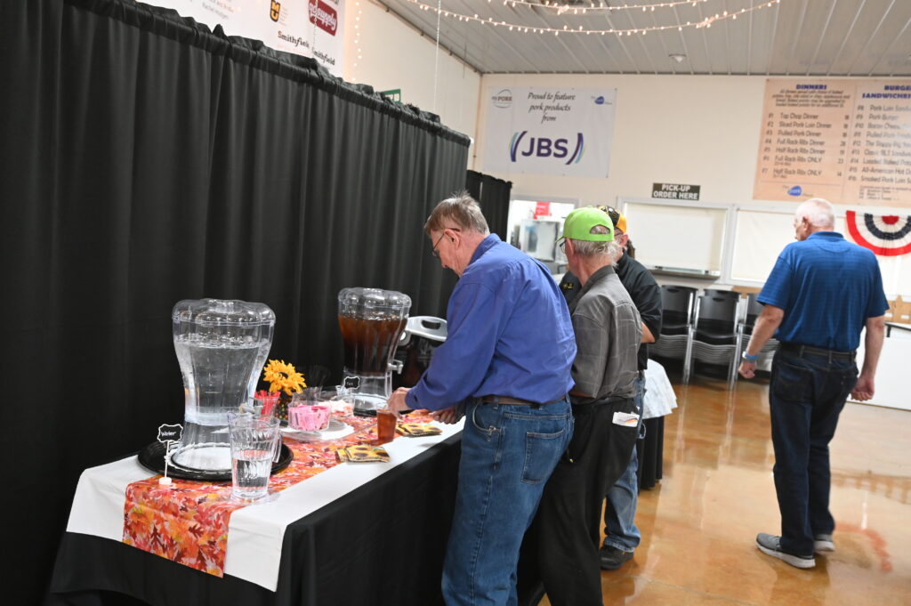 Attendees getting drinks