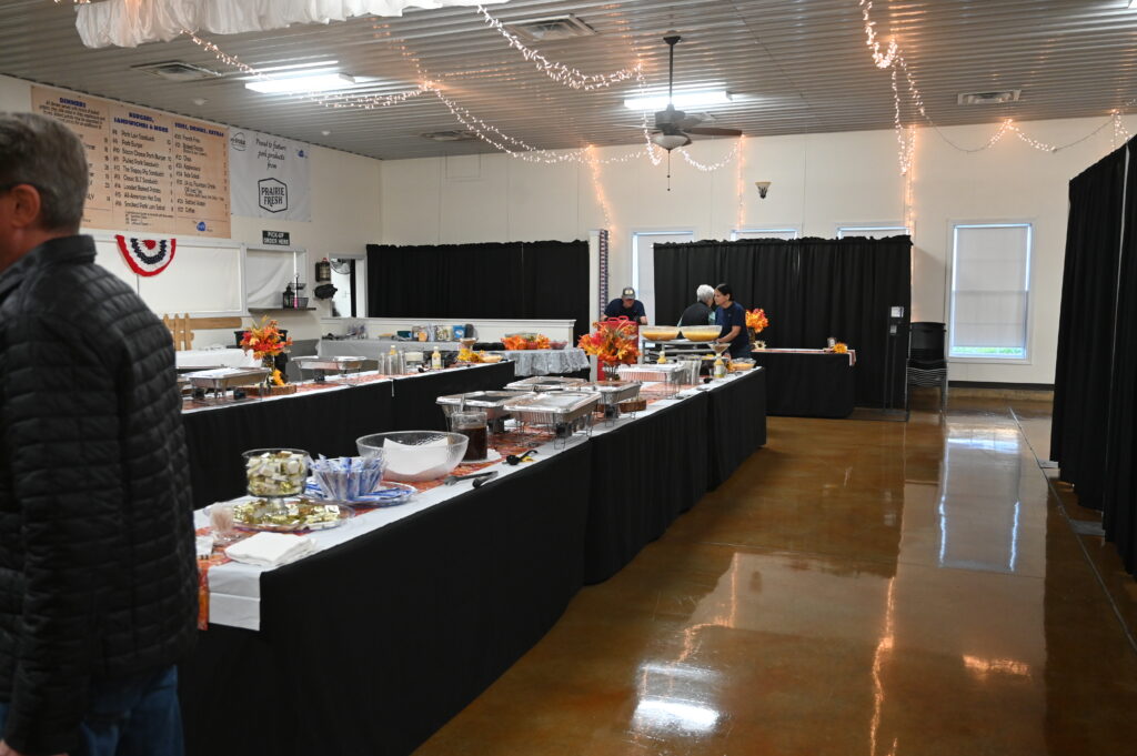 Buffet tables set up for conference attendees in event hall