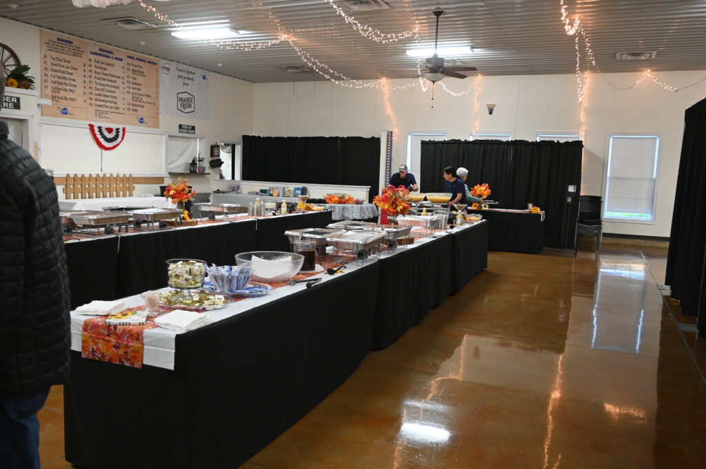 Buffet tables set up for conference attendees in event hall