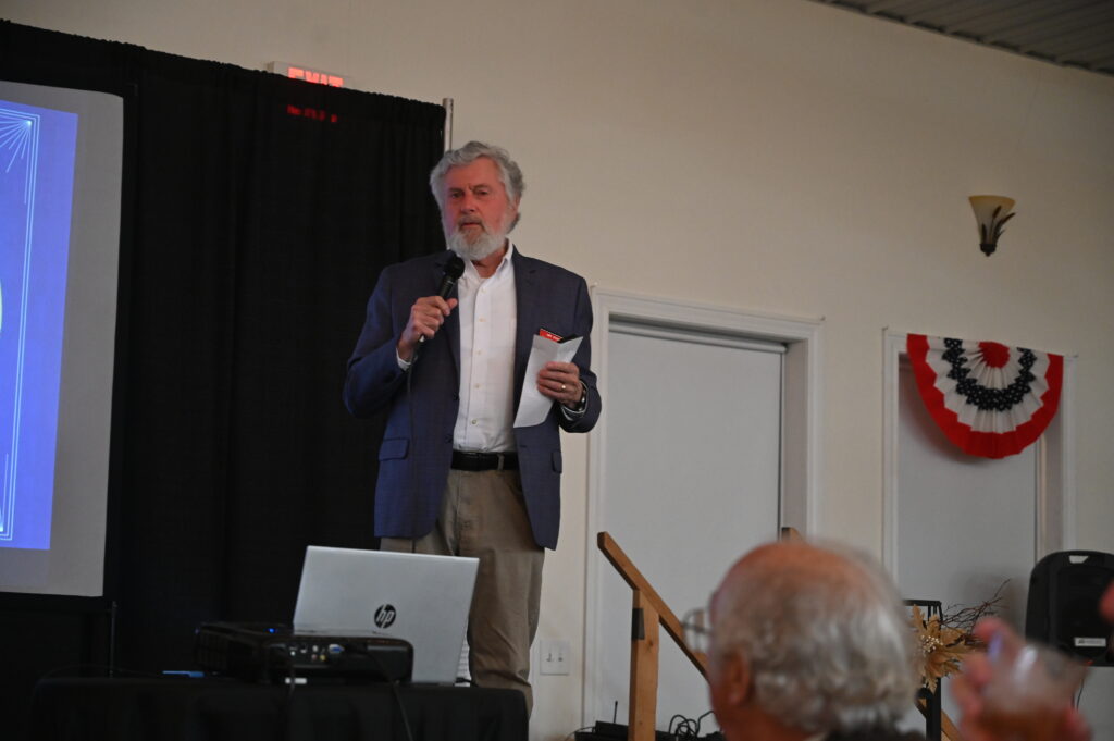 Event host giving introduction for keynote speaker