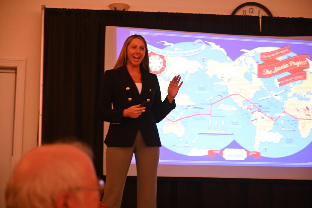 Amelia Earhart speaking during at the event